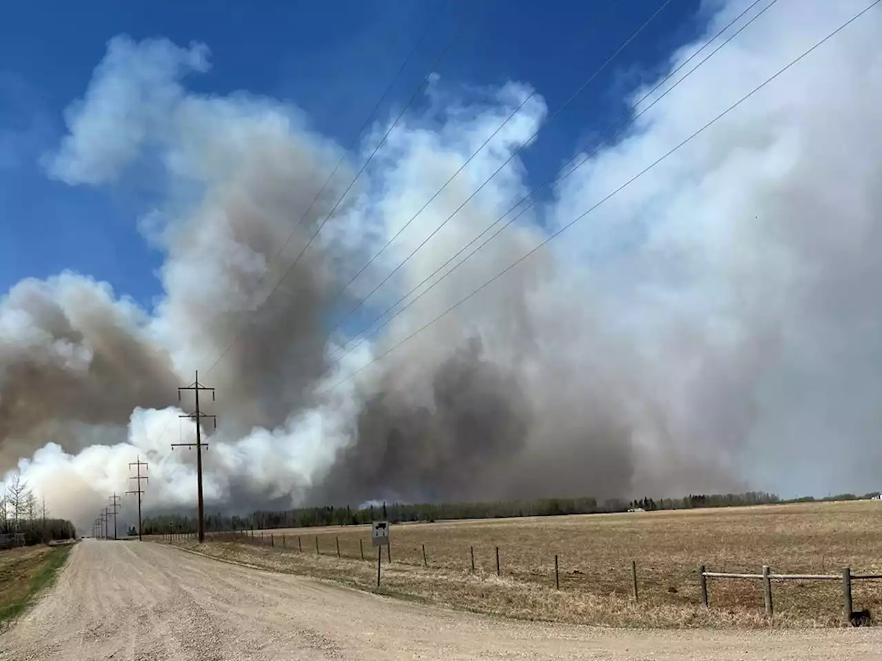 Nearly 25,000 forced from homes by Alberta wildfires