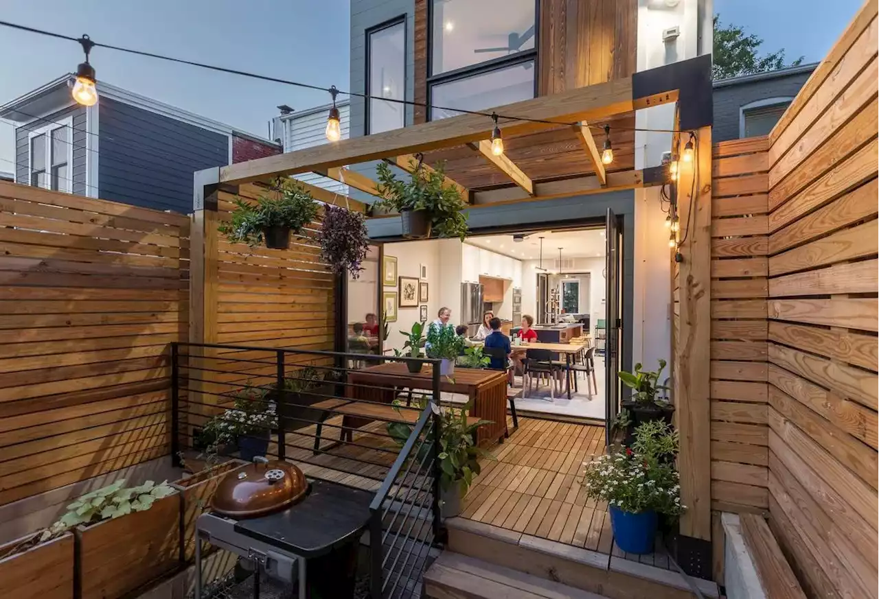 This row house is designed to produce as much energy as it uses