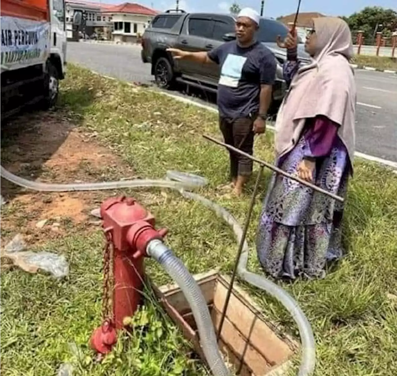 Legal Action Threatened Against PAS MP Who Used Fire Hydrant To Supply Water To Constituency In Need