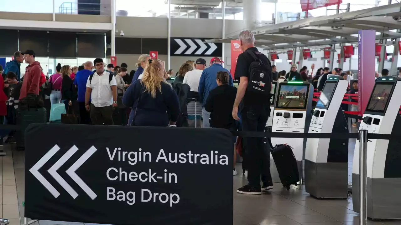 Travellers warned as wild weather plunges Sydney Airport into chaos