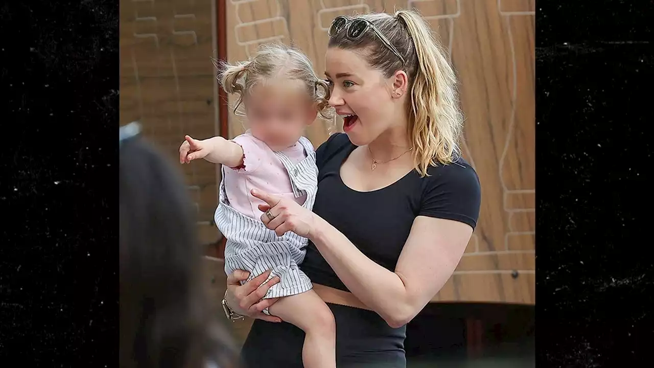 Amber Heard Hangs with Daughter in Madrid After 'Quitting Hollywood'