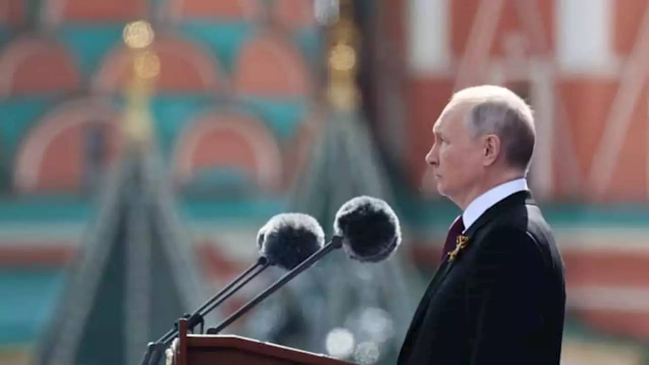 Russia’s Victory Day in pictures: Putin watches on during scaled-back parade