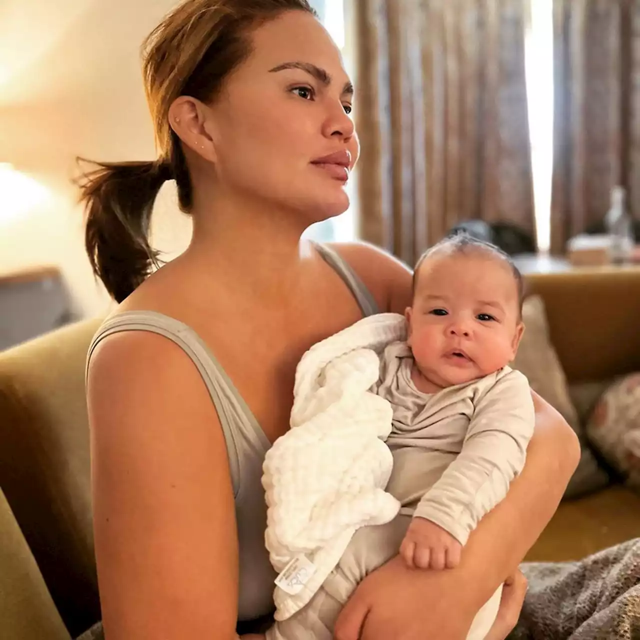 Chrissy Teigen Reacts to Speculation She Used a Surrogate to Welcome Baby Esti - E! Online