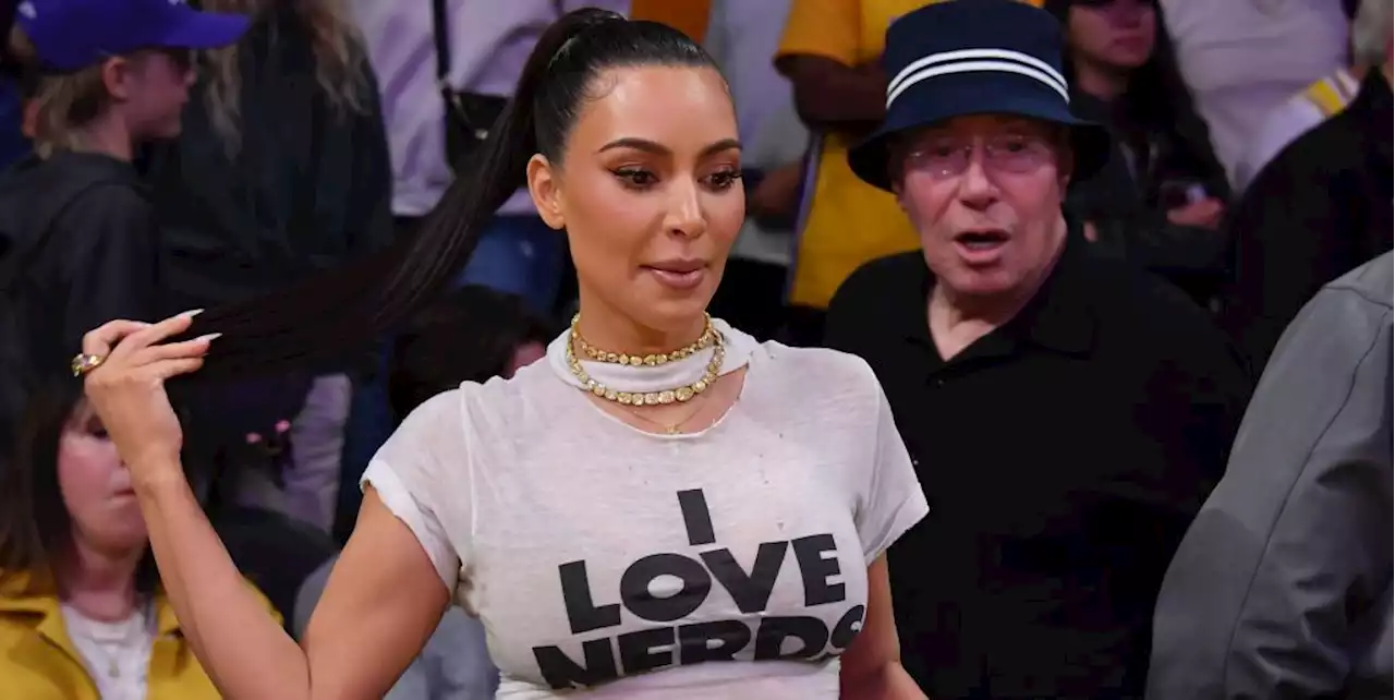 Kim Kardashian Sits Courtside at Lakers Game in 'I Love Nerds' Tee and Big Ripped Jeans