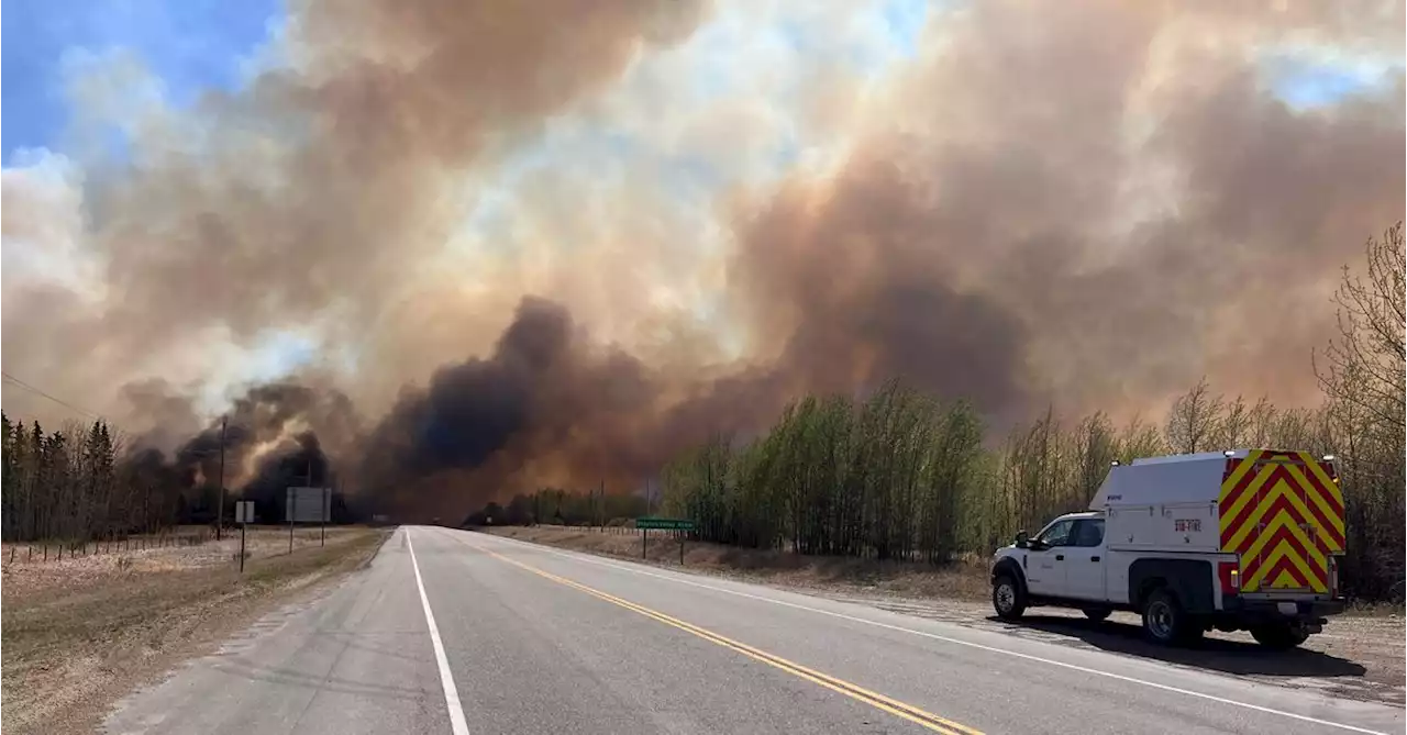 Alberta wildfires force oil production shutdowns, even as cooler weather sets in