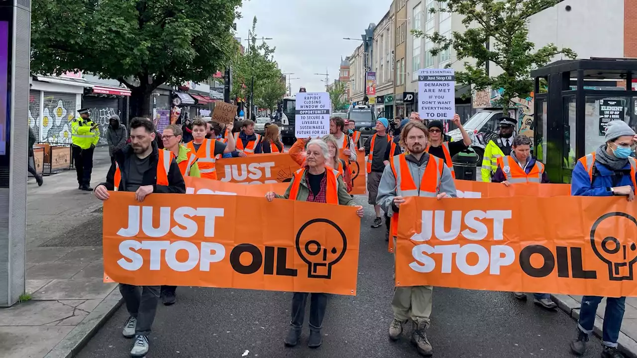 Just Stop Oil activists hold up traffic with slow march in Camden