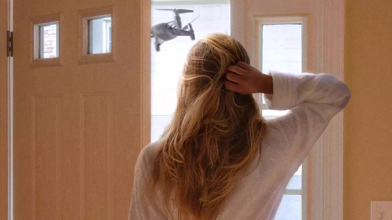 Frisky Housewife Lets Revealing Robe Slip After Opening Door To Amazon Delivery Drone