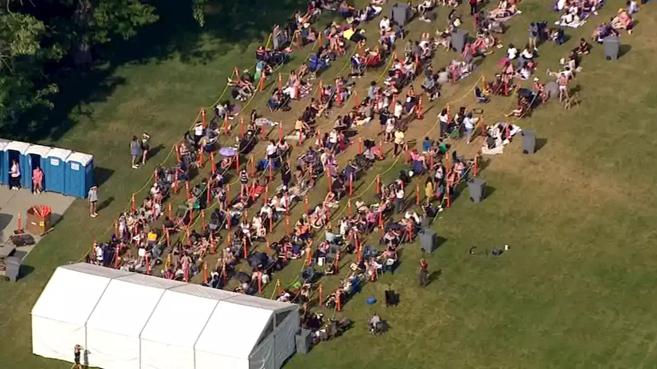 Taylor Swift fans line up outside Soldier Field to get merch before 3-night Eras Tour stop