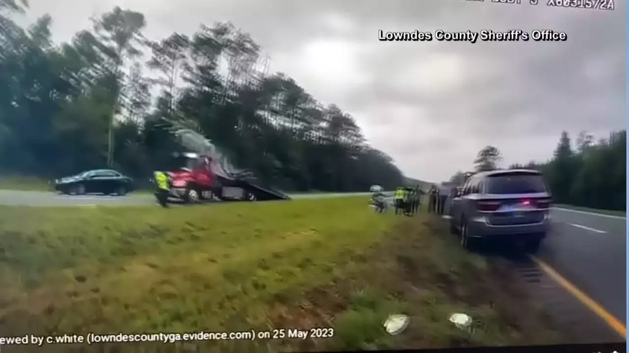 Car Flies Through The Air After Launching Off Back Of Tow Truck Ramp ...