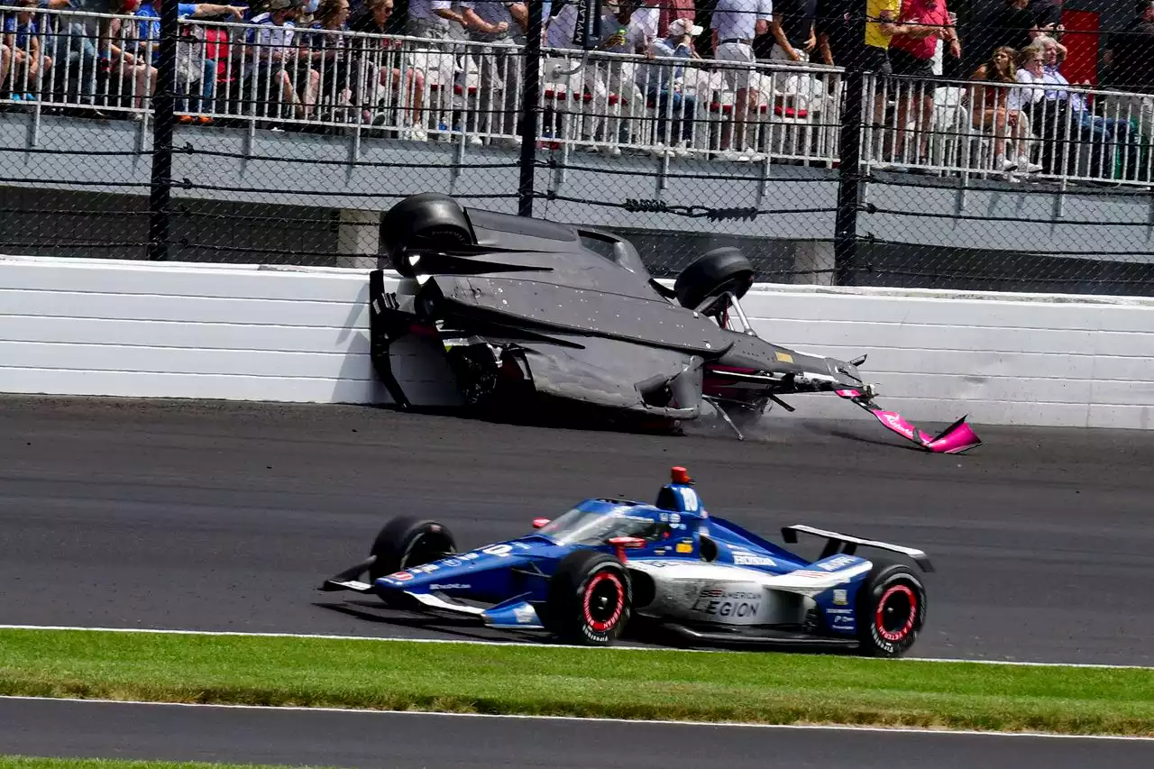 Auto racing fan to get new ride after wayward Indy 500 tire damages her parked car