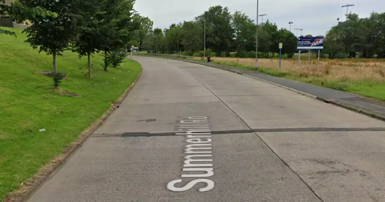 Man attacked and robbed after stopping to help 'victim' lying in middle of road