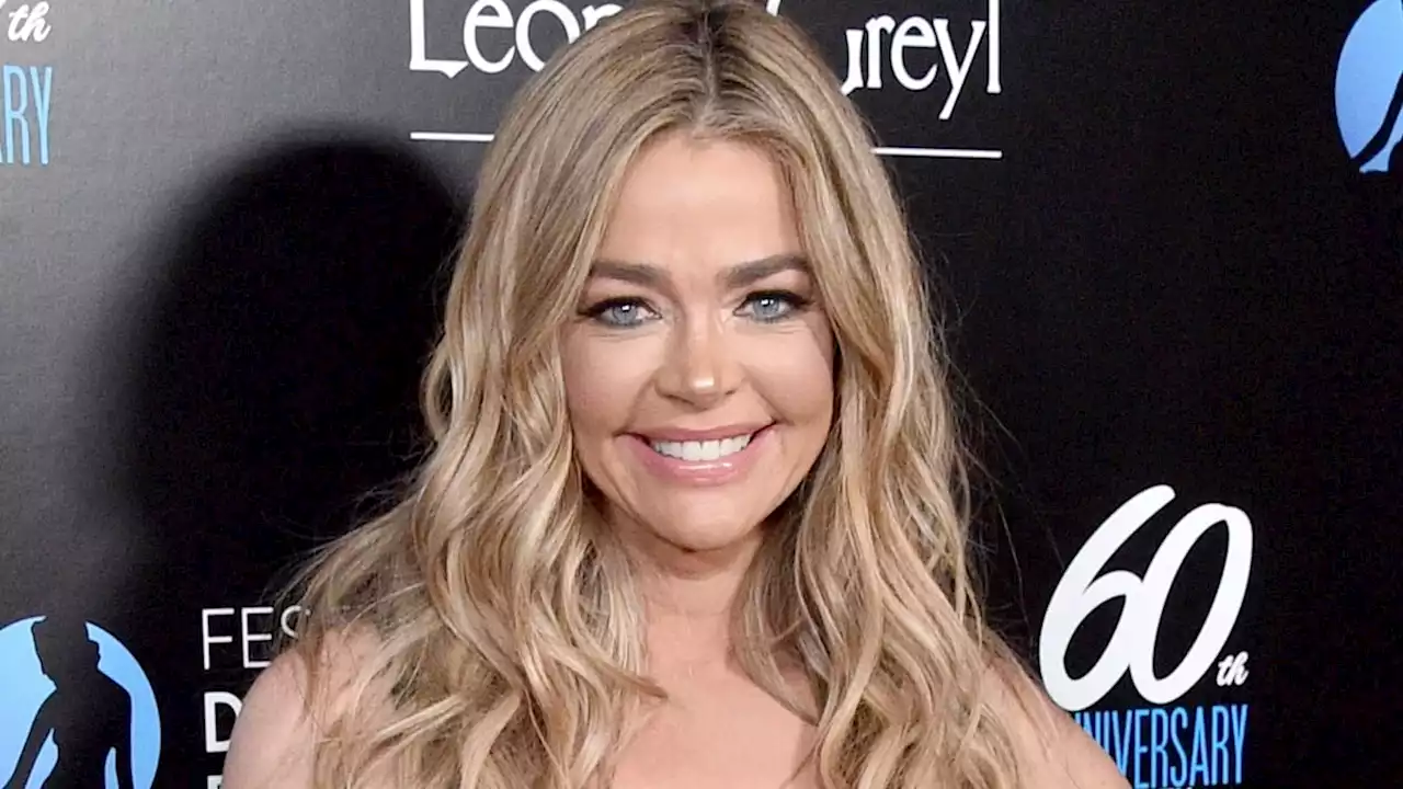 Denise Richards floors flans in figure-hugging mini dress with the most amazing detailing