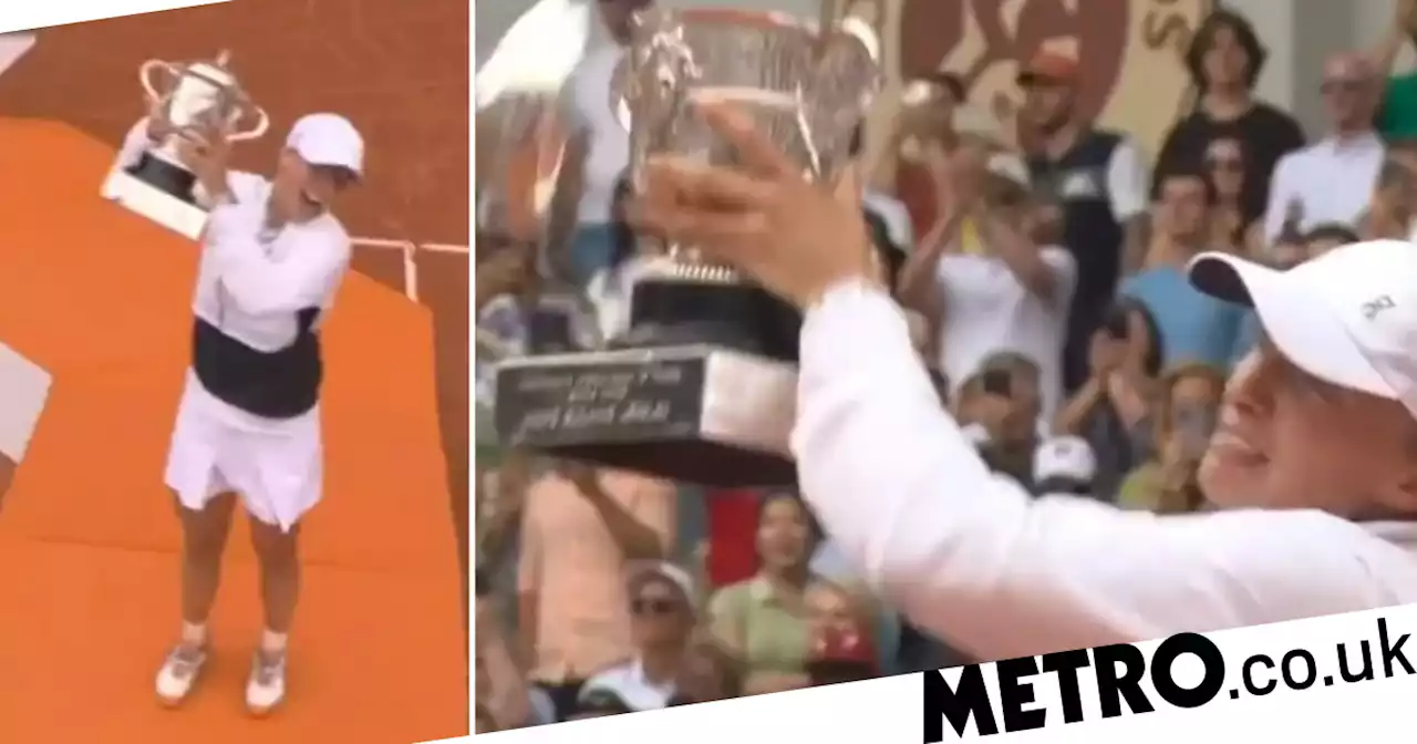 Iga Swiatek drops French Open trophy lid and apologises for 'being such a pain'