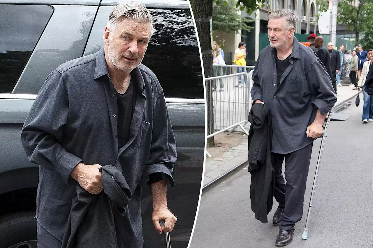 Alec Baldwin seen walking with a cane in New York City after hip surgery