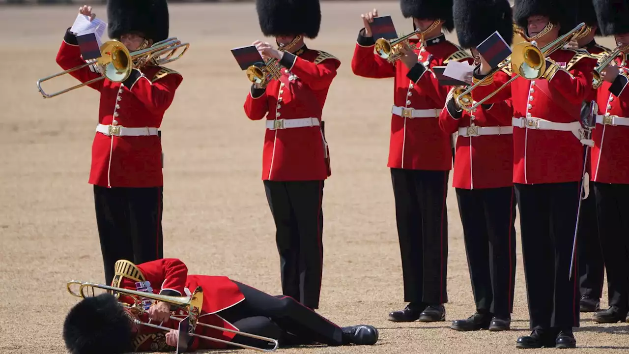 At least three troops faint in military parade inspected by Prince William as temperatures soar