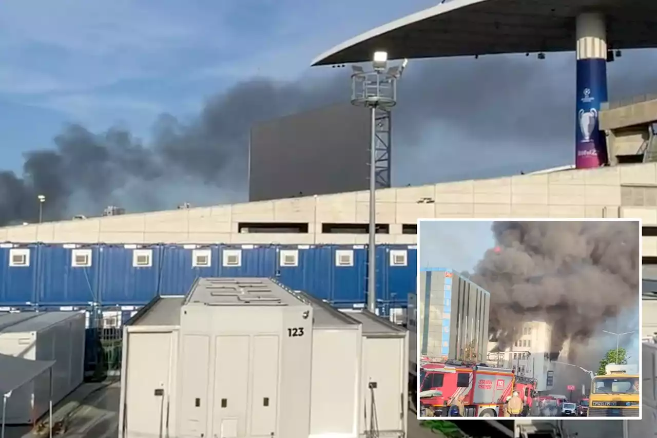 Champions League final stadium engulfed in black smoke as huge fire breaks out