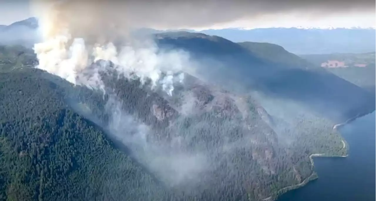 Light rain welcome but Cameron Bluffs fire continues to grow