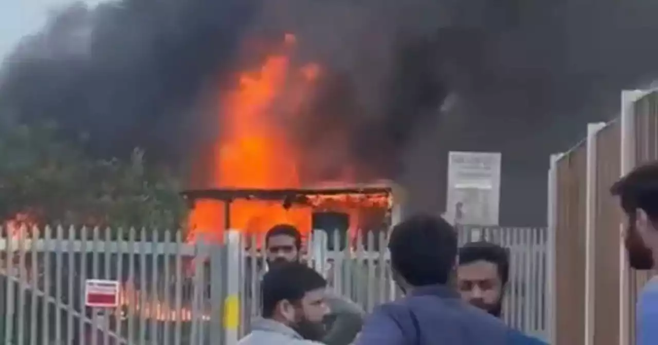 Residents flee as video shows fire and explosions on industrial park