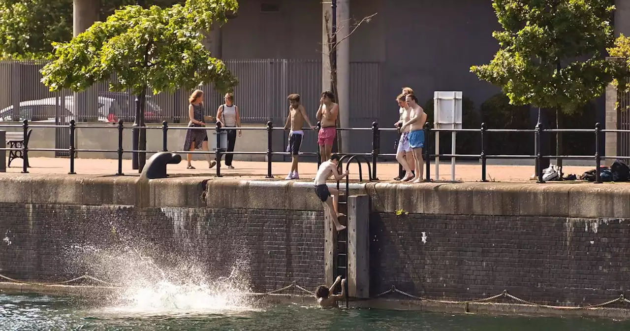 Dozens ignore risk to life warnings to go swimming in Salford Quays