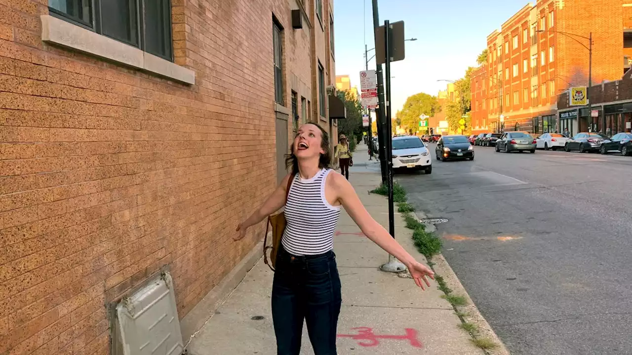 Woman Basks In Magic Of Summer While Opening Her Mouth To Sky To Catch Air-Conditioner Drippings