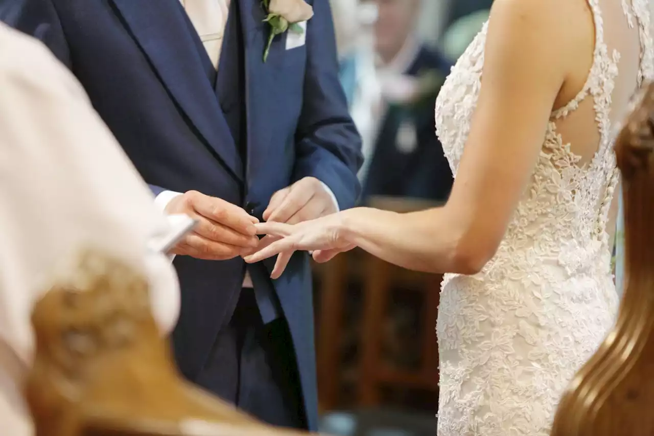 Mother-of-the-groom is savaged for wearing a white gown to her son's big day