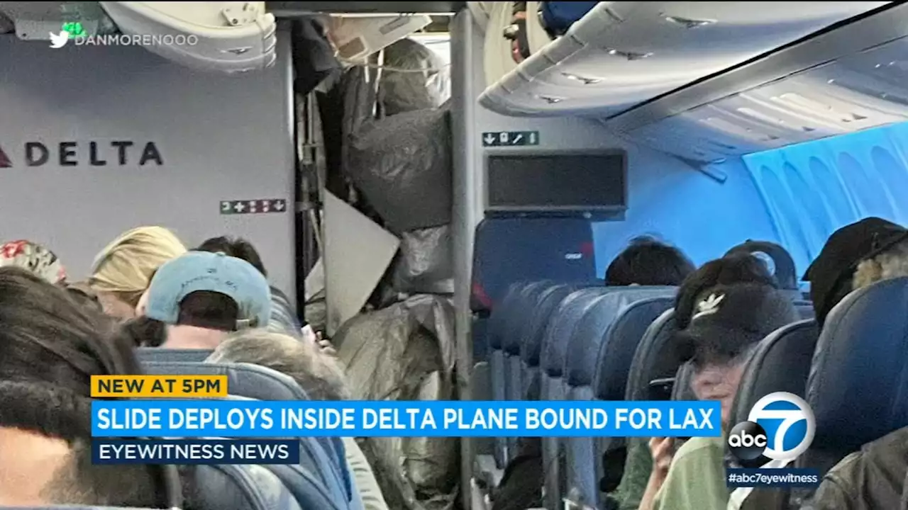 Crew member injured after emergency slide deploys inside Delta plane during flight