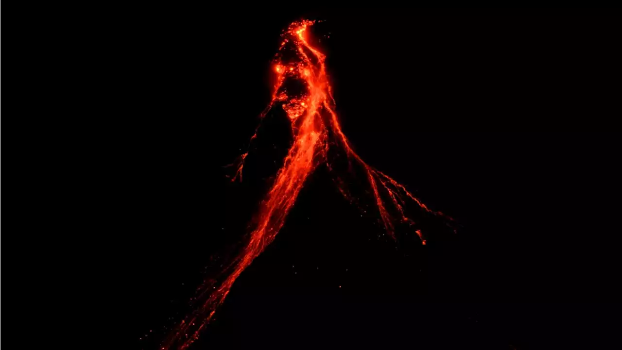 Philippines' Mayon Volcano spews lava down its slopes in gentle eruption putting thousands on alert