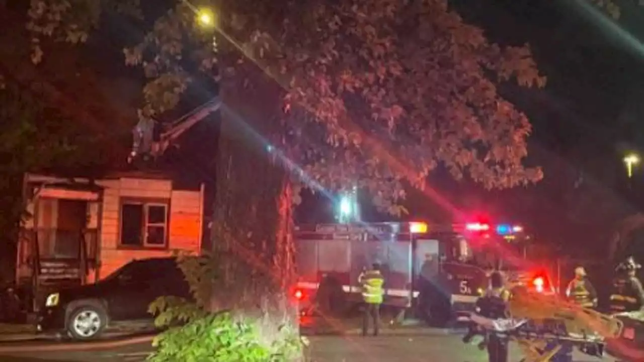 2 men injured, 1 critically, after fire erupts at South Side home