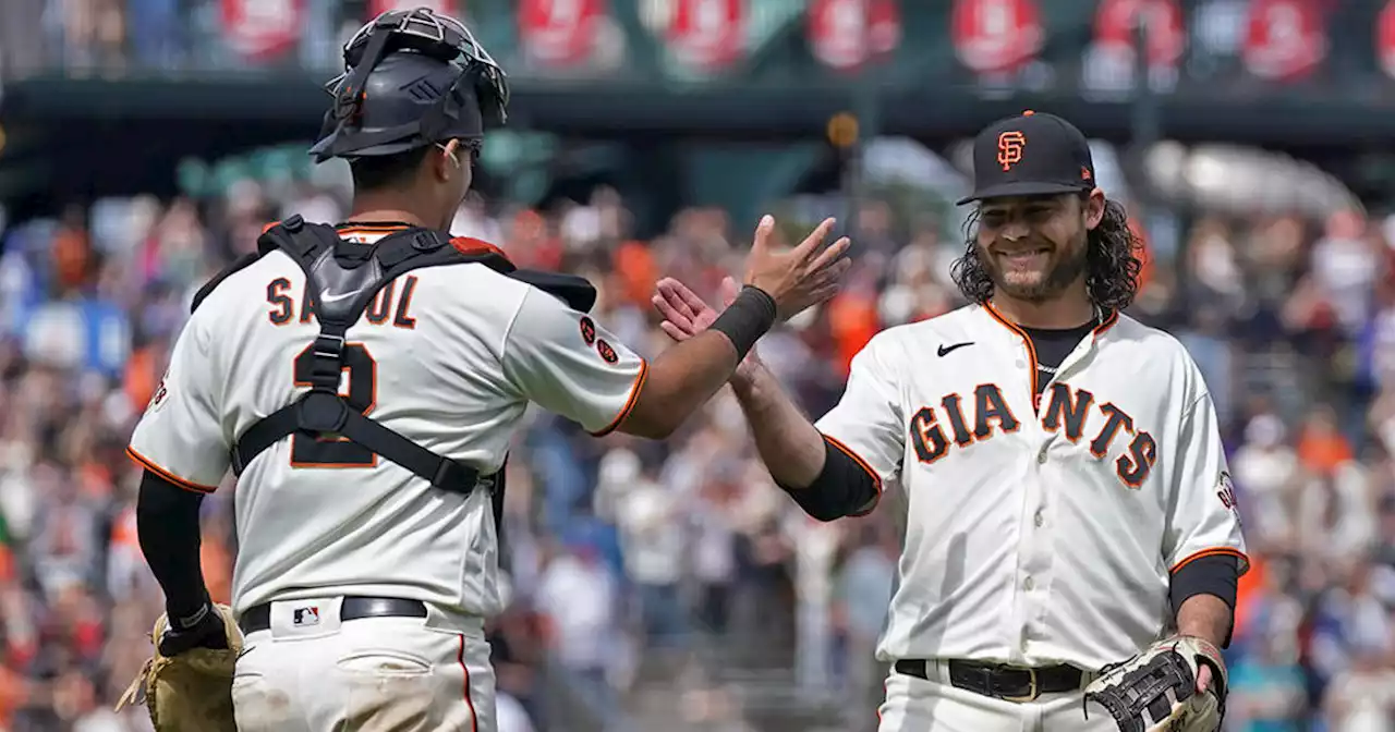 SS Crawford pitches as Giants rout Cubs 13-3