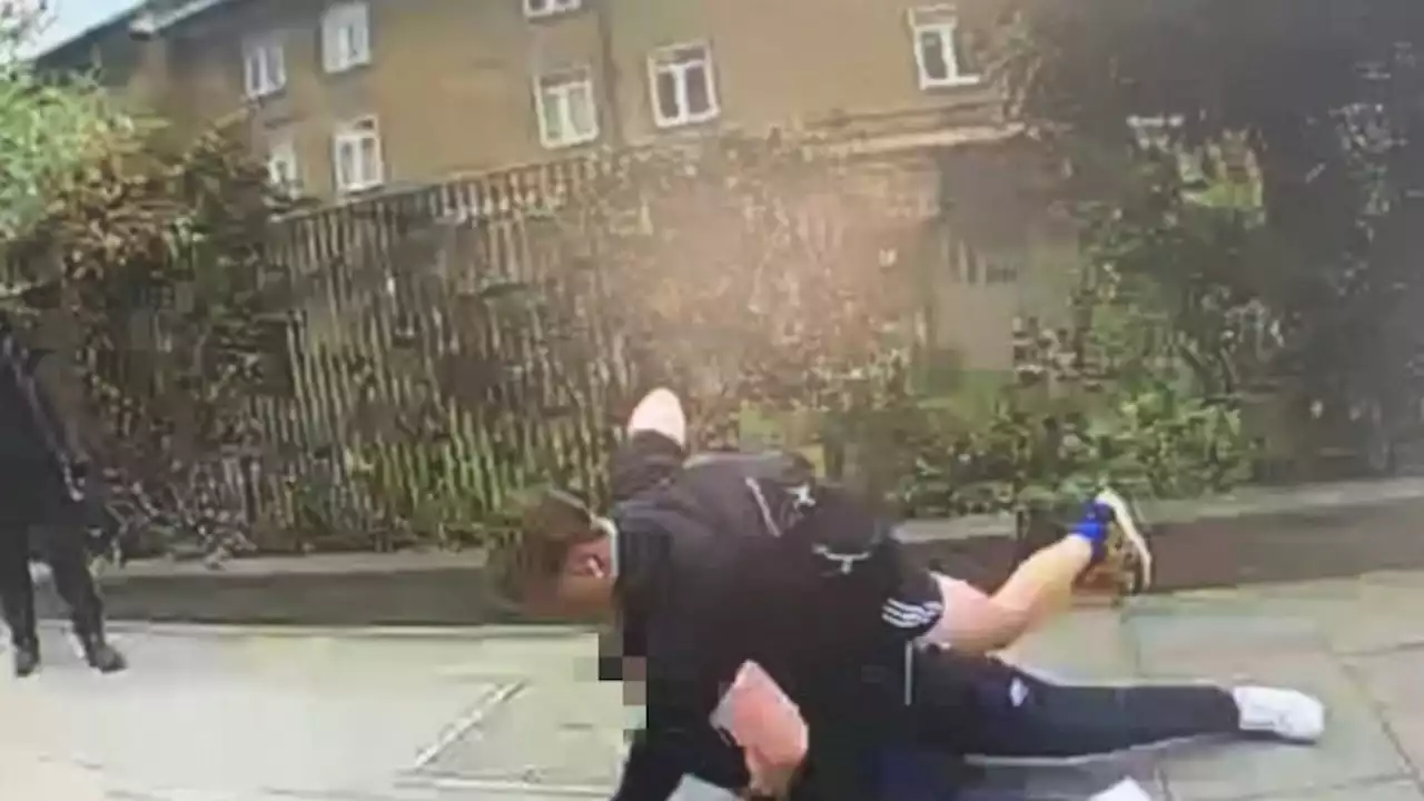 Moment off-duty police officer tackles knife-wielding youth targeting people for their phones in east London