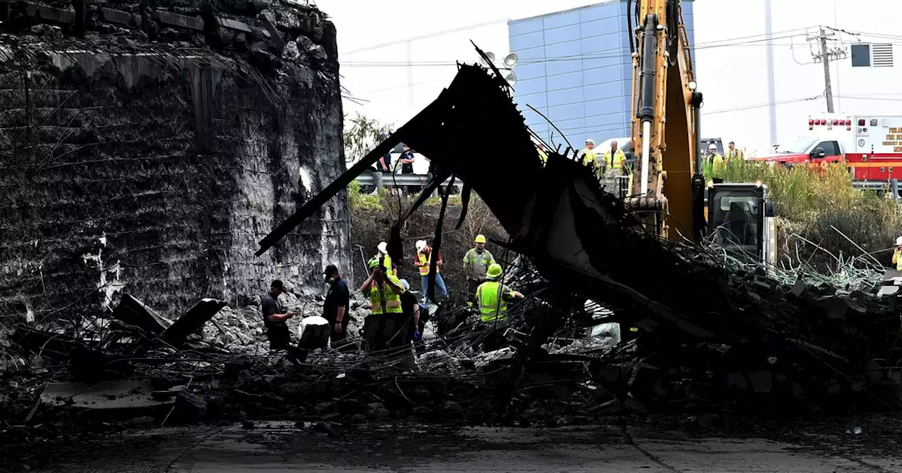 Rescue workers pull body from wreckage of explosion under I-95 overpass in Philadelphia