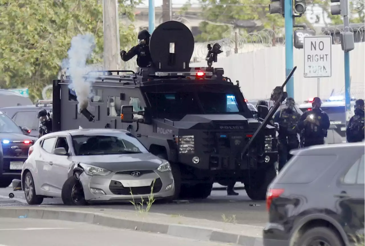 Police standoff near BART Coliseum station after suspect rams police car