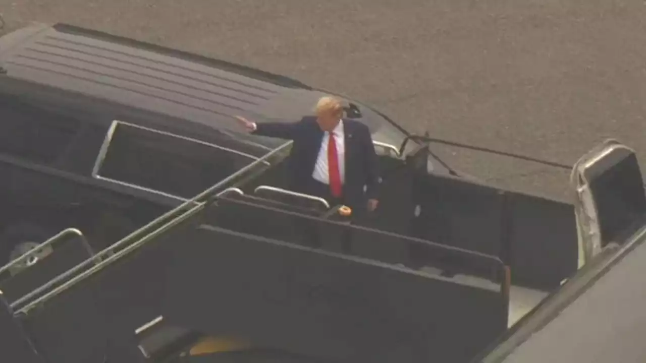 Donald Trump boards plane to Florida ahead of court appearance