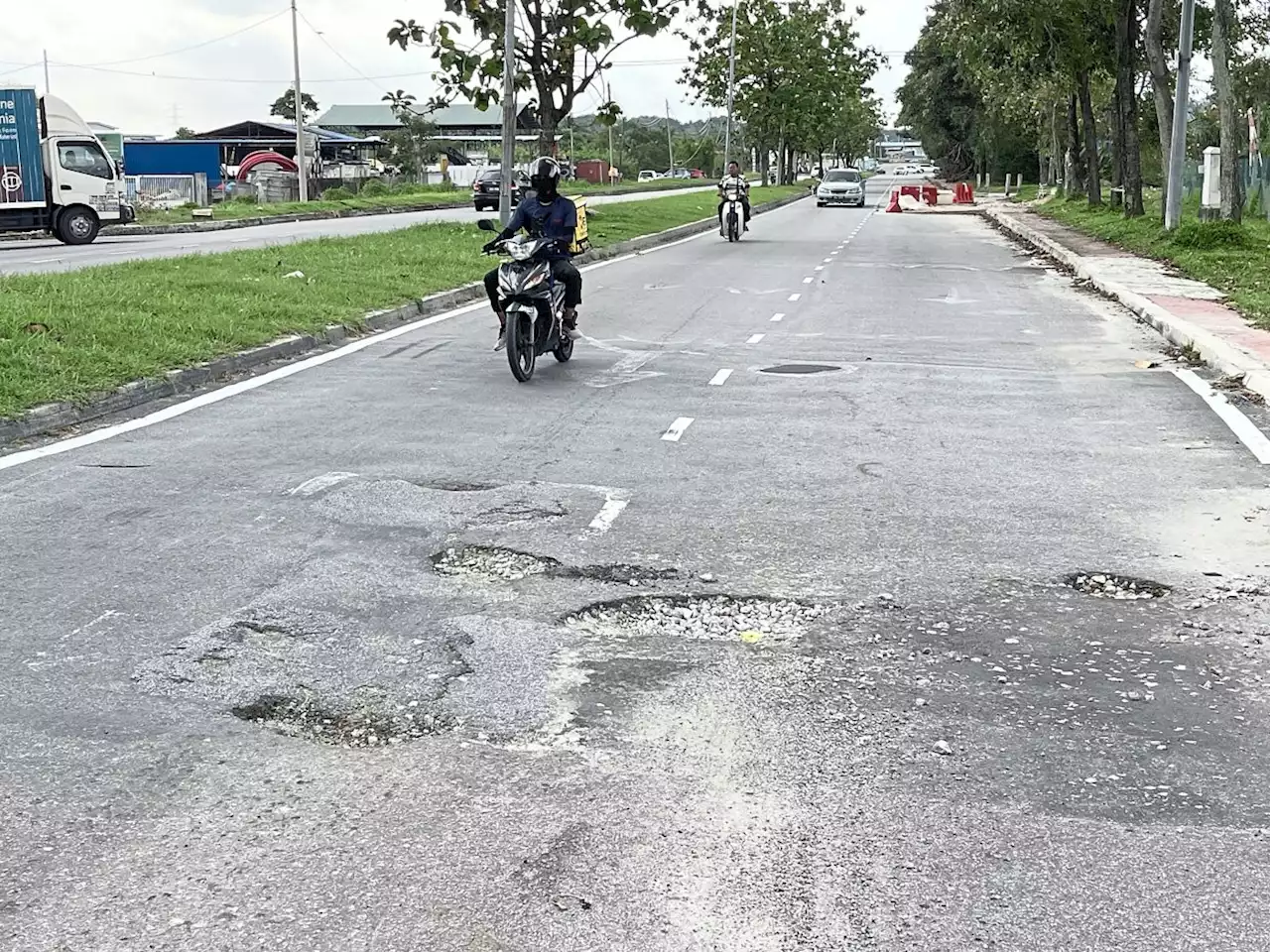 ‘Sinking road needs permanent solution’