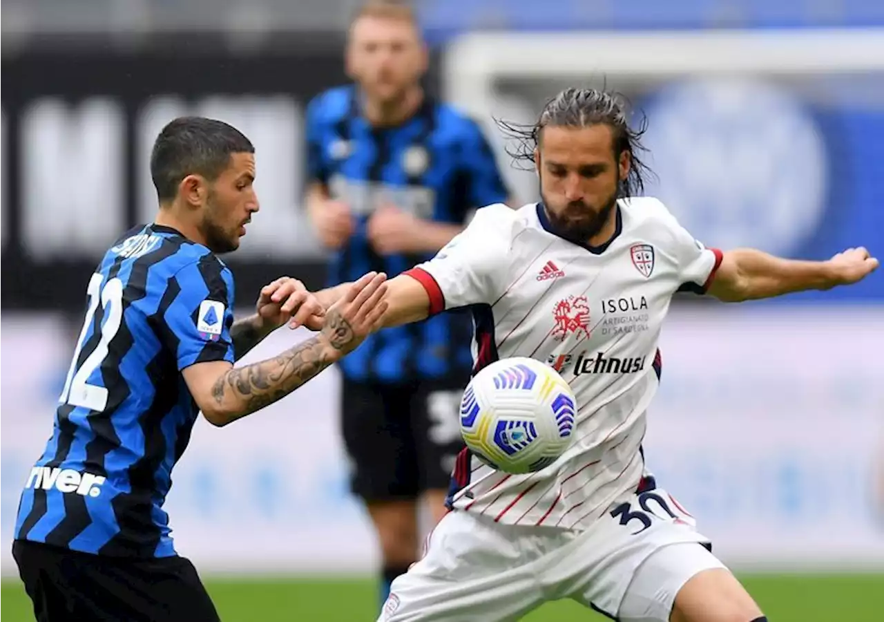 Soccer-Cagliari score stoppage-time winner to snatch promotion from Bari