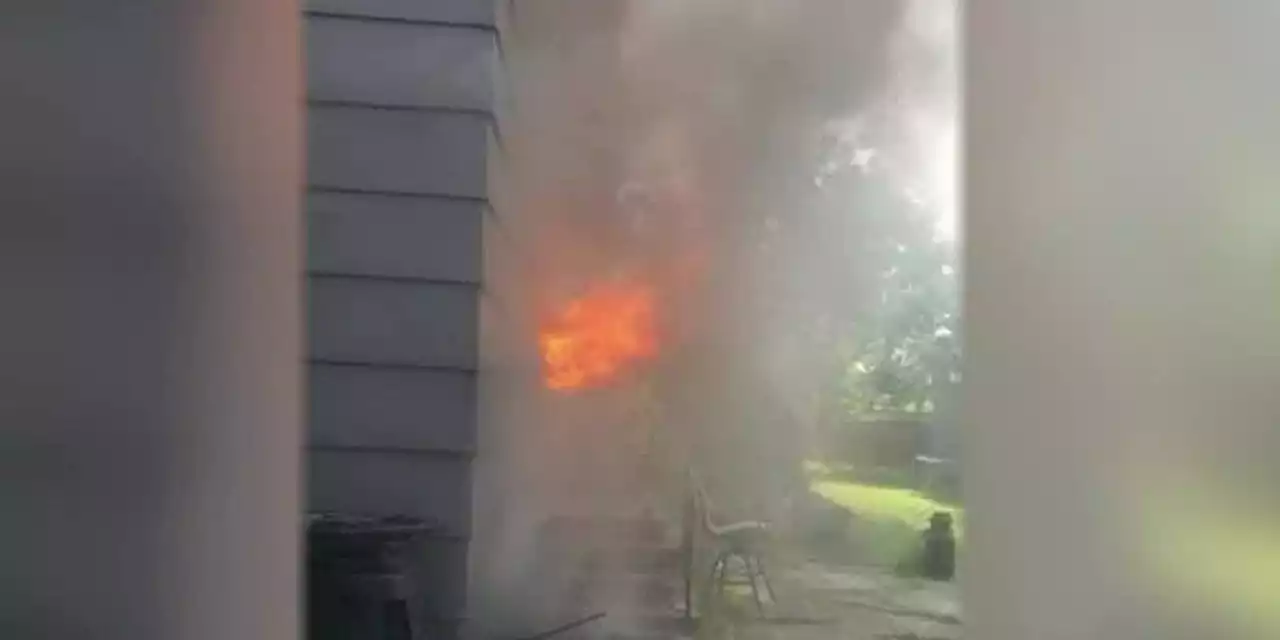 911 dispatcher answers call that her own home is on fire