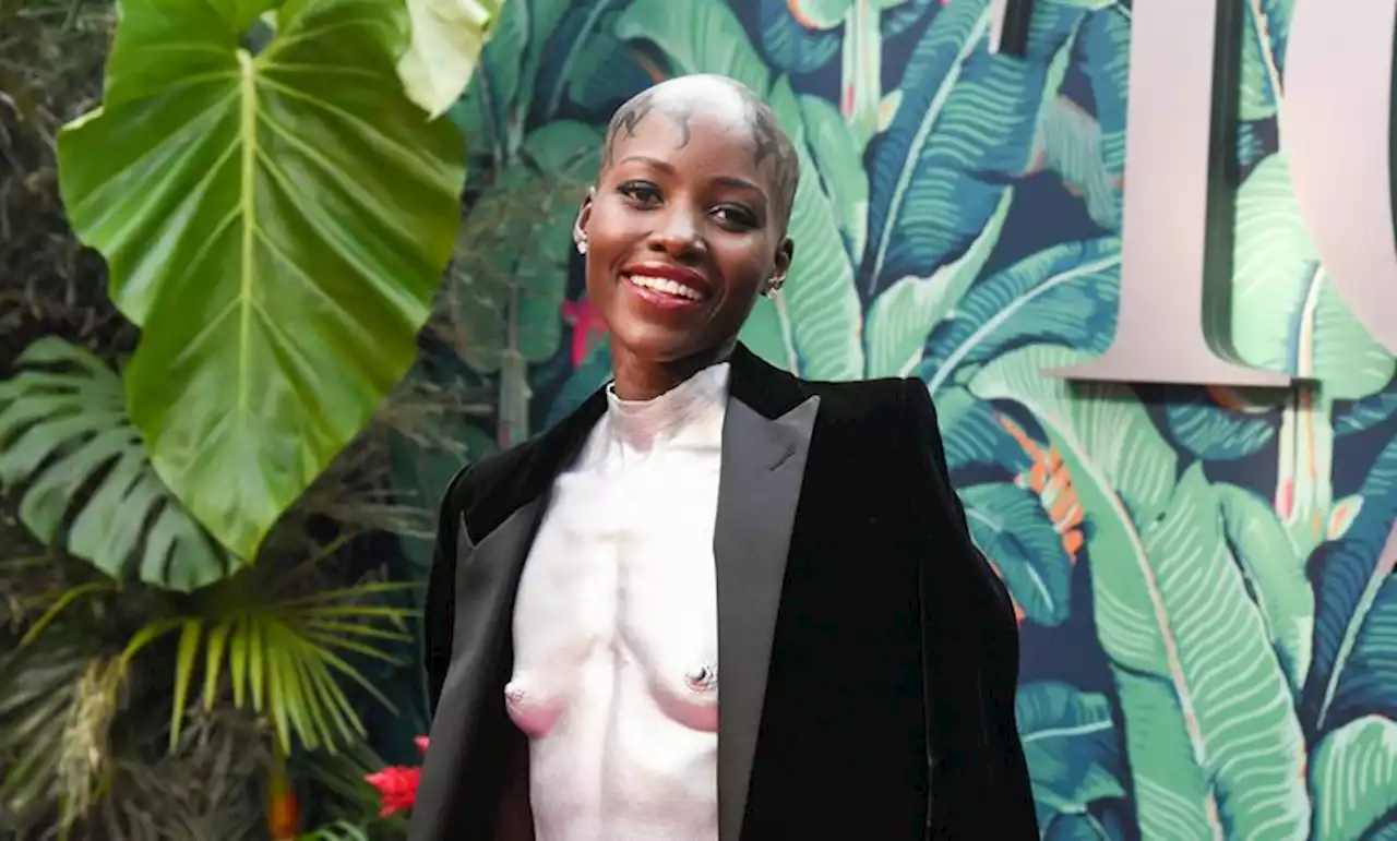 Lupita Nyong’o Suits Up in Black Velvet Ensemble With Custom Misha Japanwala Breastplate at the 2023 Tony Awards