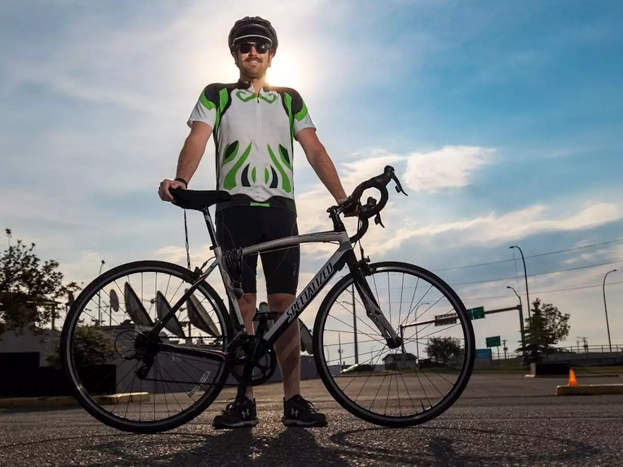 Calgary hands-free cyclist bests world record, awaiting confirmation