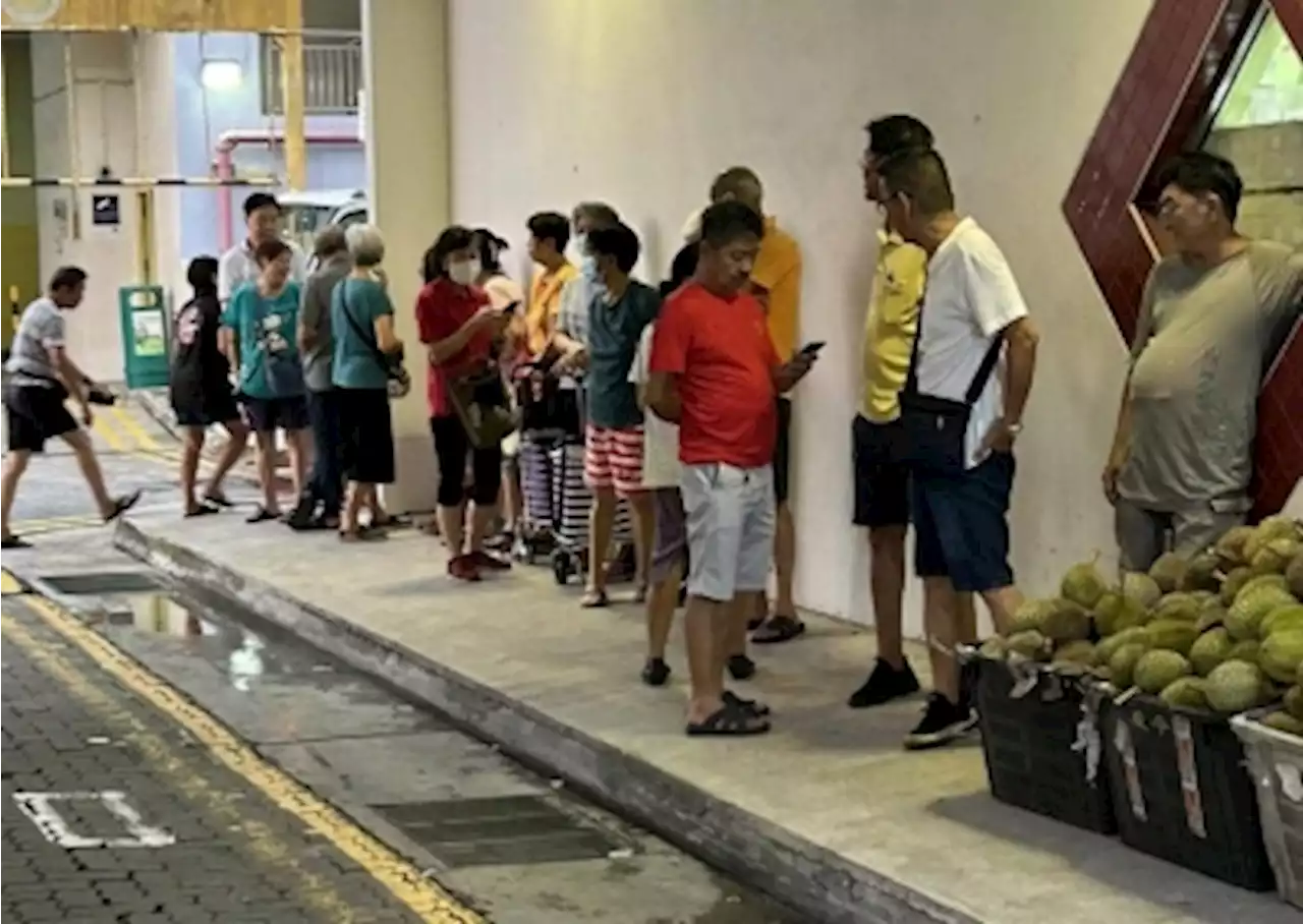 Singapore durian seller gives back to society by distributing free durians to senior citizens