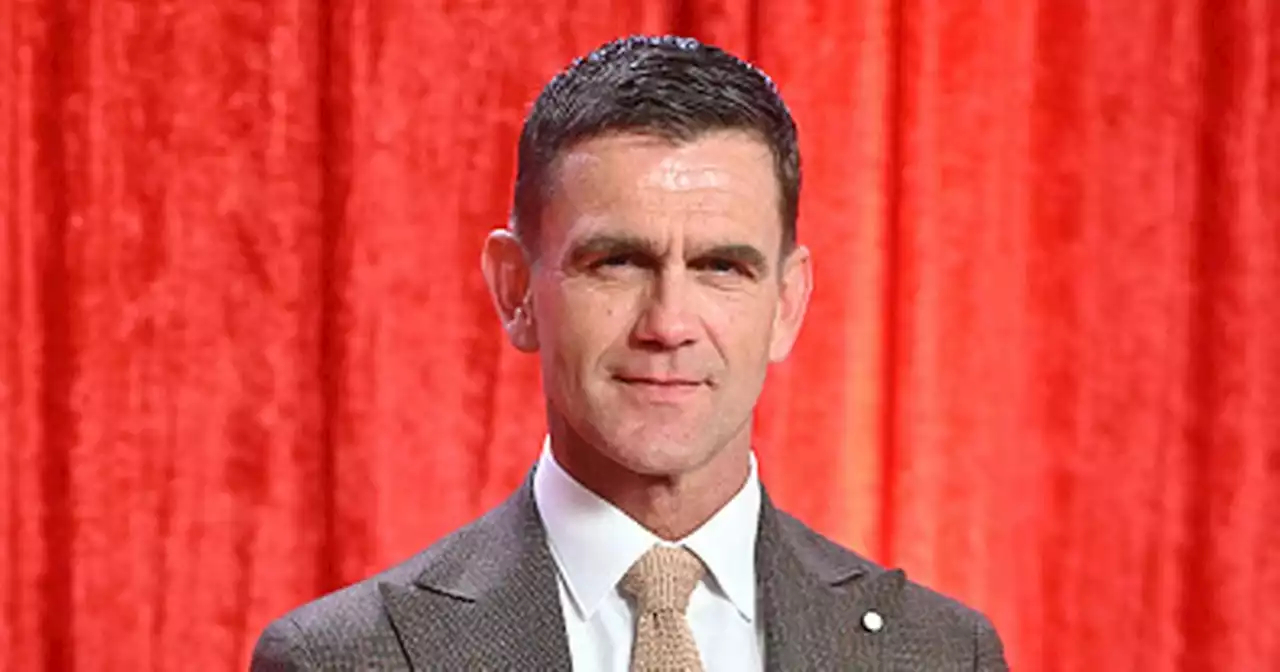 EastEnders hunk Scott Maslen poses with rarely seen son who looks just like him