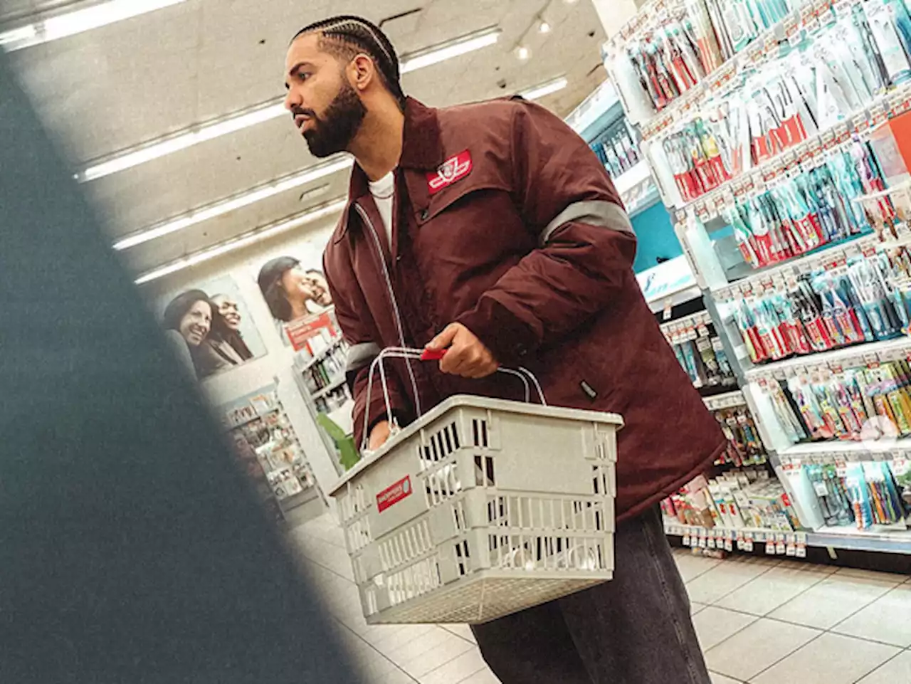 Drake hits up Shoppers Drug Mart in a TTC coat before leaving on tour