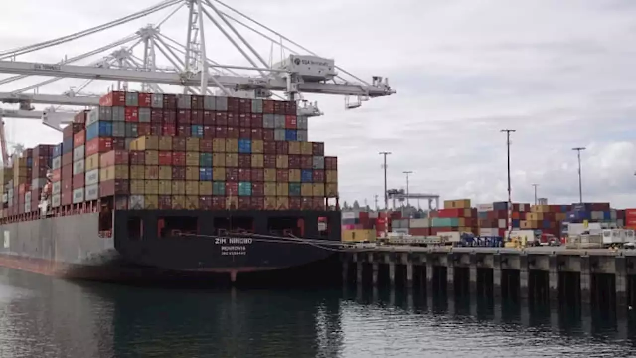 Tentative agreement ends worker slowdowns and stoppages that crippled West Coast ports