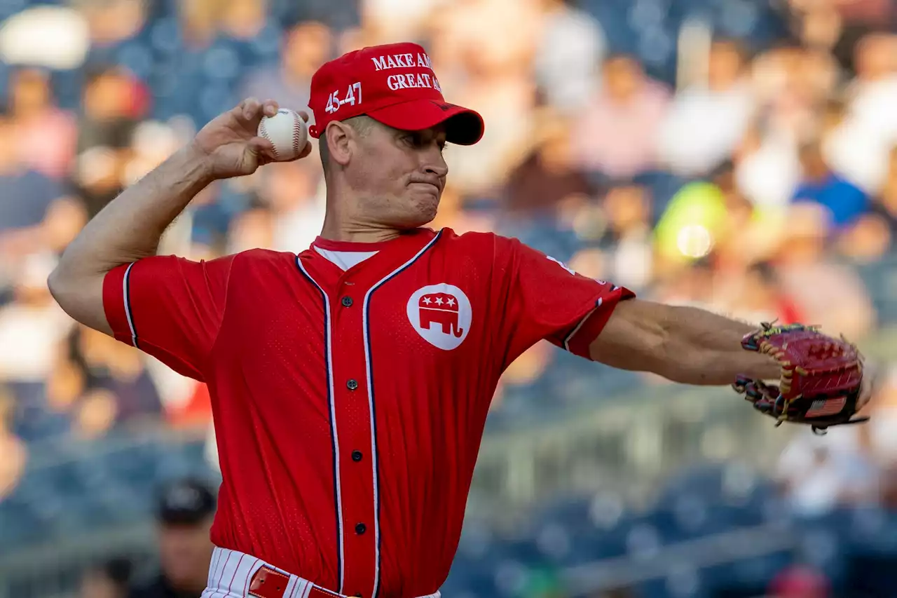 Greg Steube wears signed MAGA baseball hat in congressional baseball game