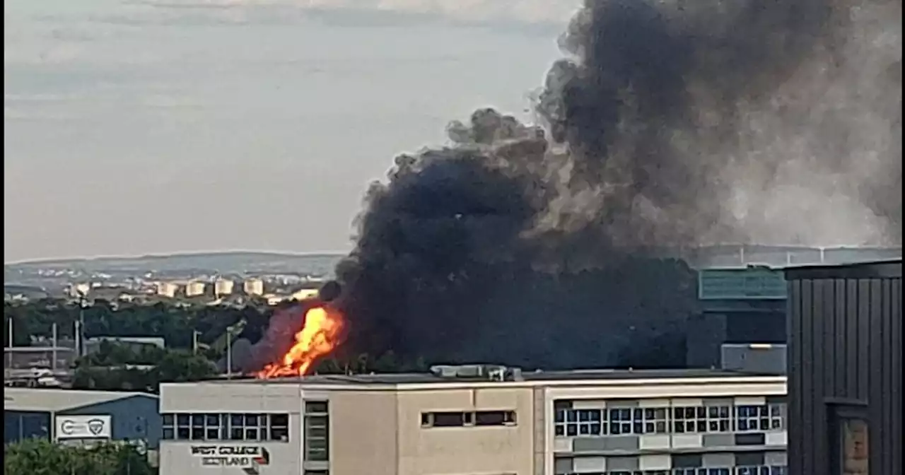 Footage shows as explosion hits Clydebank boatyard as building up in flames