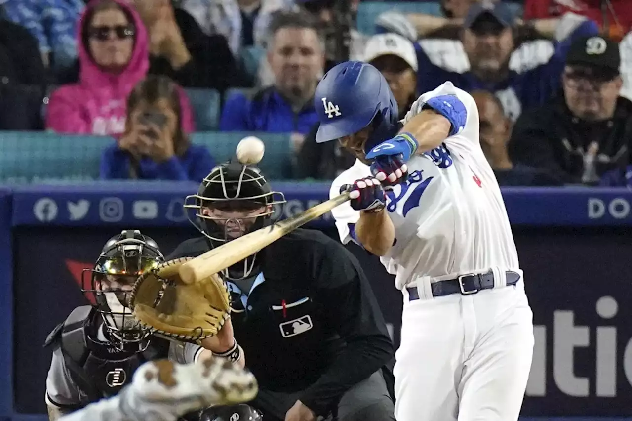 Dodgers work 11 innings to beat White Sox in their final at-bat