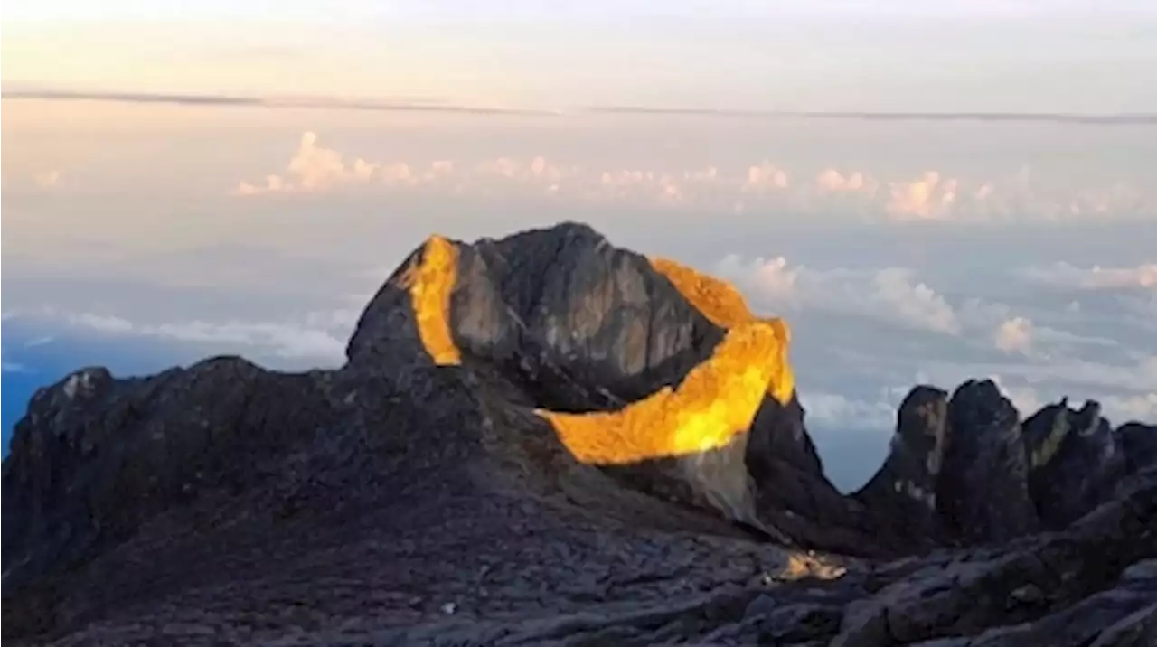 Sabah Parks: Sunlight refraction gives Mt Kinabalu ‘golden halo’