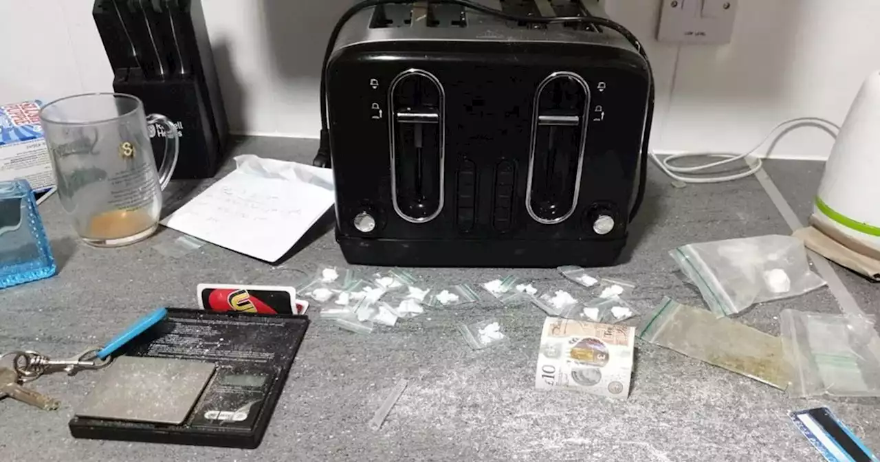 Man arrested after cash, Class A drugs and phones seized from home