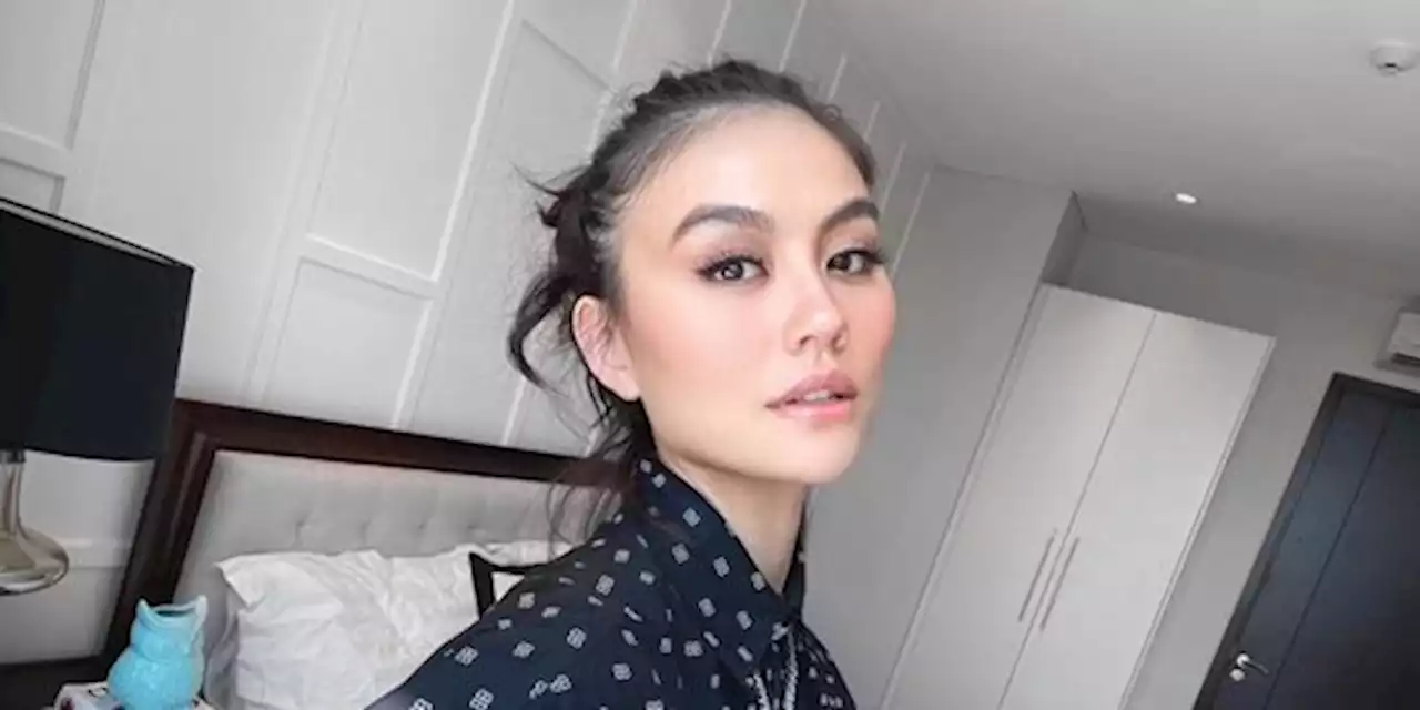 Agnez Mo Tiba-Tiba Unggah Foto Hitam Gelap, Penuh Tanda Tanya | merdeka.com