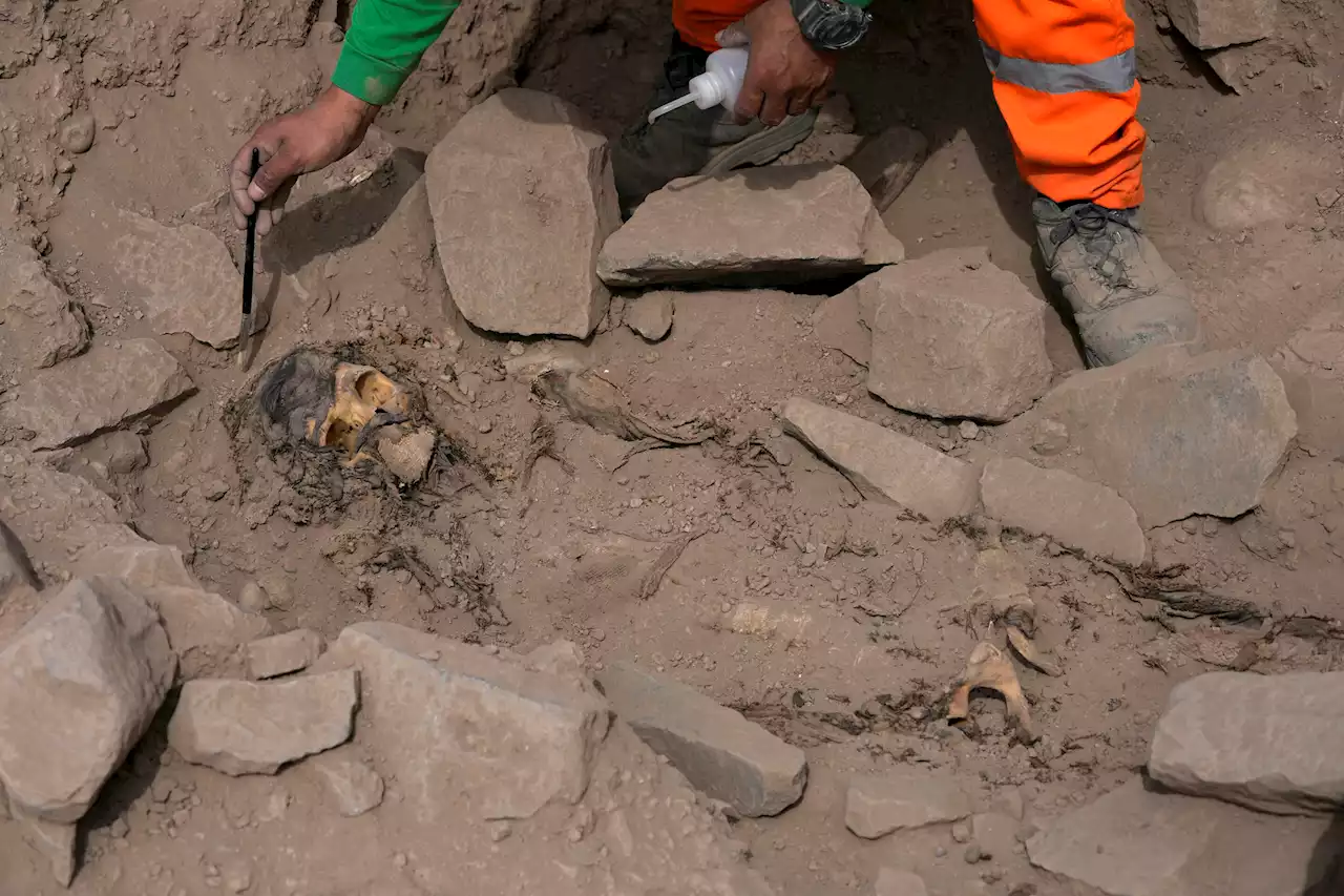 Archaeologists find mummy surrounded by coca leaves on hilltop in Peru's capital