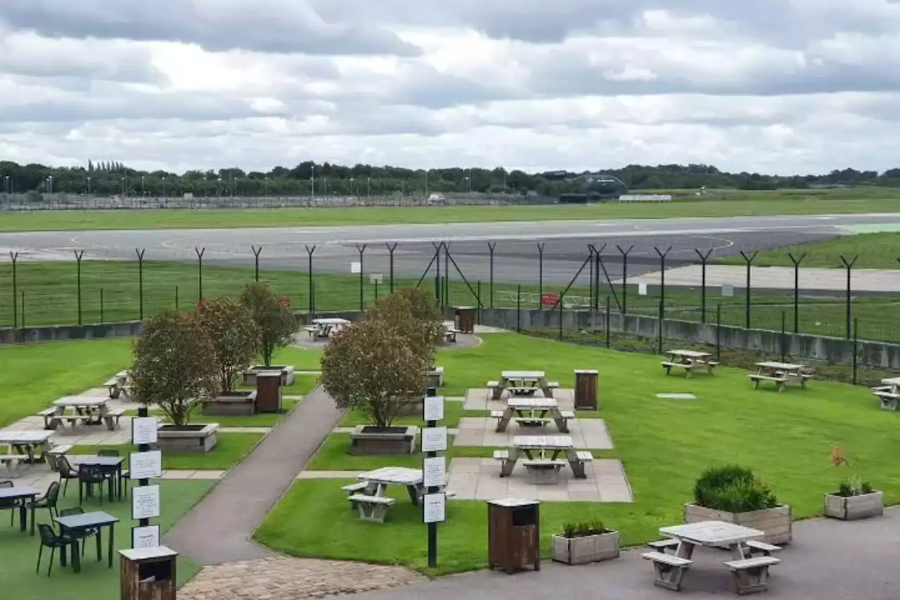 UK airport that has a beer garden right next to the runway